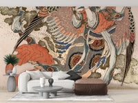 Asian Angel wallpaper mural in terracotta and blue tones above a white sofa and brown leather ottoman in a living room