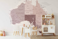 The Australian landscape is a central focus of the image.

