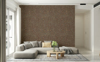 Textured wallpaper mural featuring radiating organic shapes that evoke falling autumn leaves.