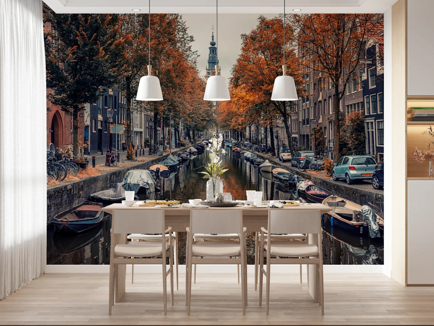 Autumn Canal Charm wallpaper mural of an autumn canal behind a white dining table and three pendant lights in a dining room