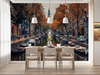 Autumn Canal Charm wallpaper mural of an autumn canal behind a white dining table and three pendant lights in a dining room