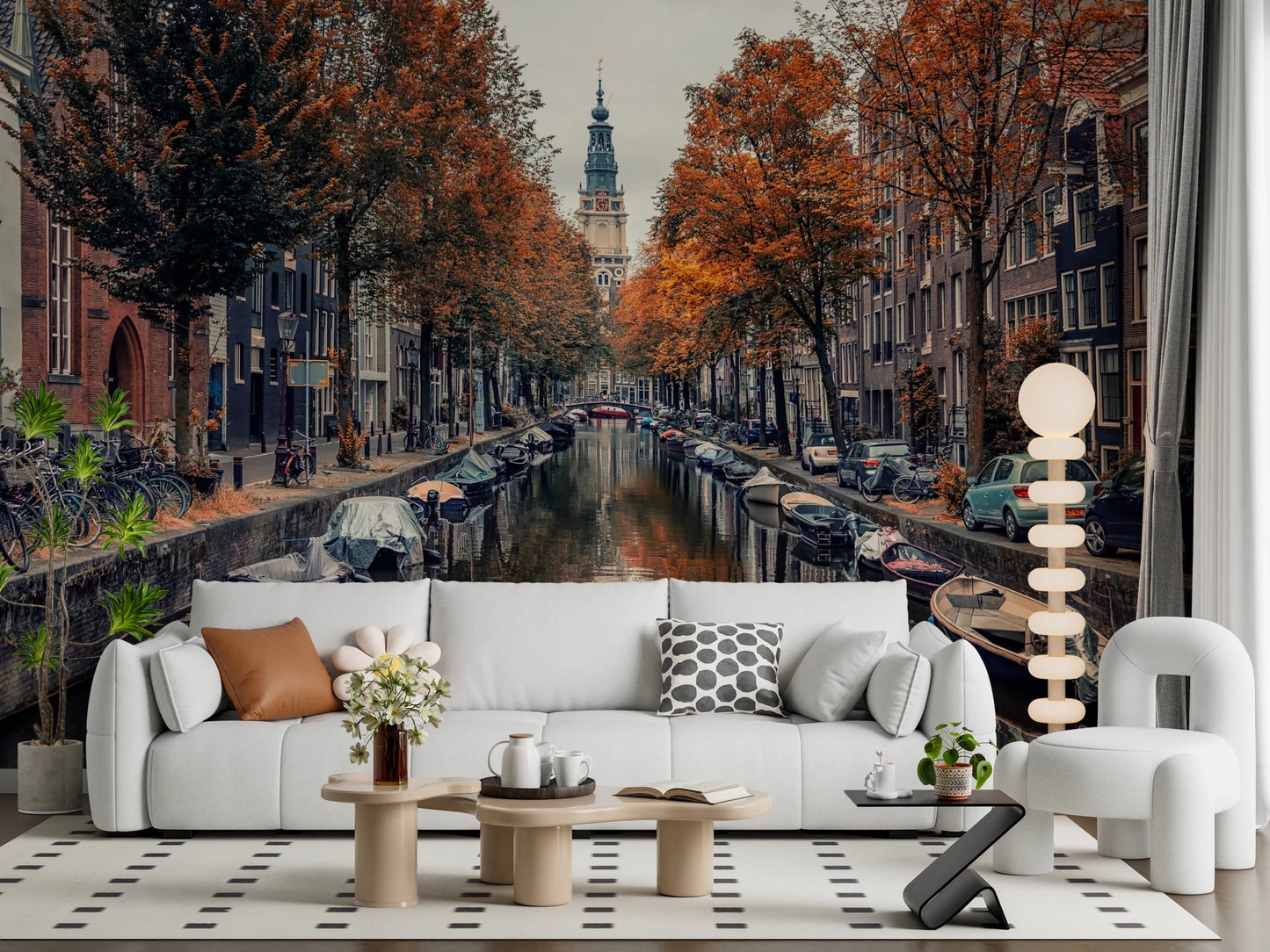 Autumn Canal Charm wallpaper mural of an autumn canal behind a white sofa and beaded floor lamp in a living room