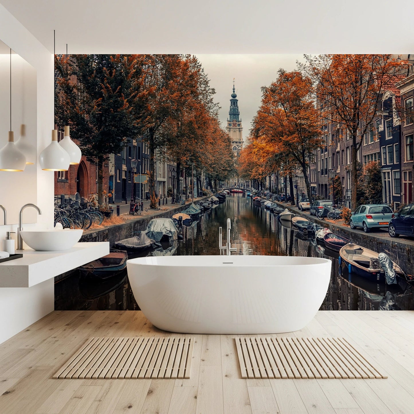 Autumn Canal Charm wallpaper mural of an autumn canal behind a freestanding white tub and vanity in a bright bathroom