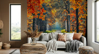 Forest wallpaper style autumn path wall mural with orange wallpaper leaves and soft green wallpaper accents