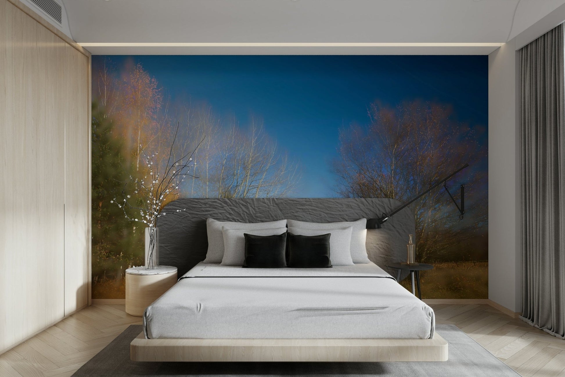 The mural shows a stand of trees with yellow and orange leaves.

