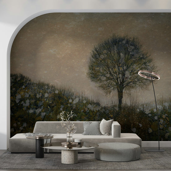 Autumnal Dreams wallpaper mural of a lone autumn tree on a misty meadow behind a grey sofa and ring floor lamp