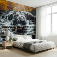 Autumn Waterfall Wall Mural behind headboard, warm color palette, nature bedroom accent wall