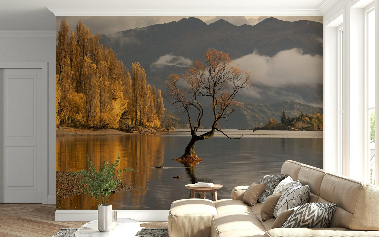 Autumn woodland mural in lounge, soft warm colors, modern apartment feature wall