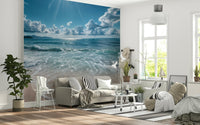 Soft sky-and-sea wall mural in nursery, light blues and whites