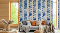 Modern abstract swirl mural in rich azure blue tones.