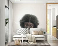 Adorable baby monkey wallpaper with jungle theme.