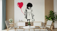 Balloon Girl Art wallpaper mural of a girl with a red heart balloon above a wood credenza and woven chairs