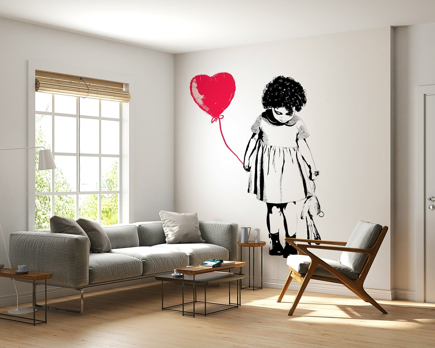 Balloon Girl Art wallpaper mural of a girl and red heart balloon behind a grey sofa and wood-frame armchair