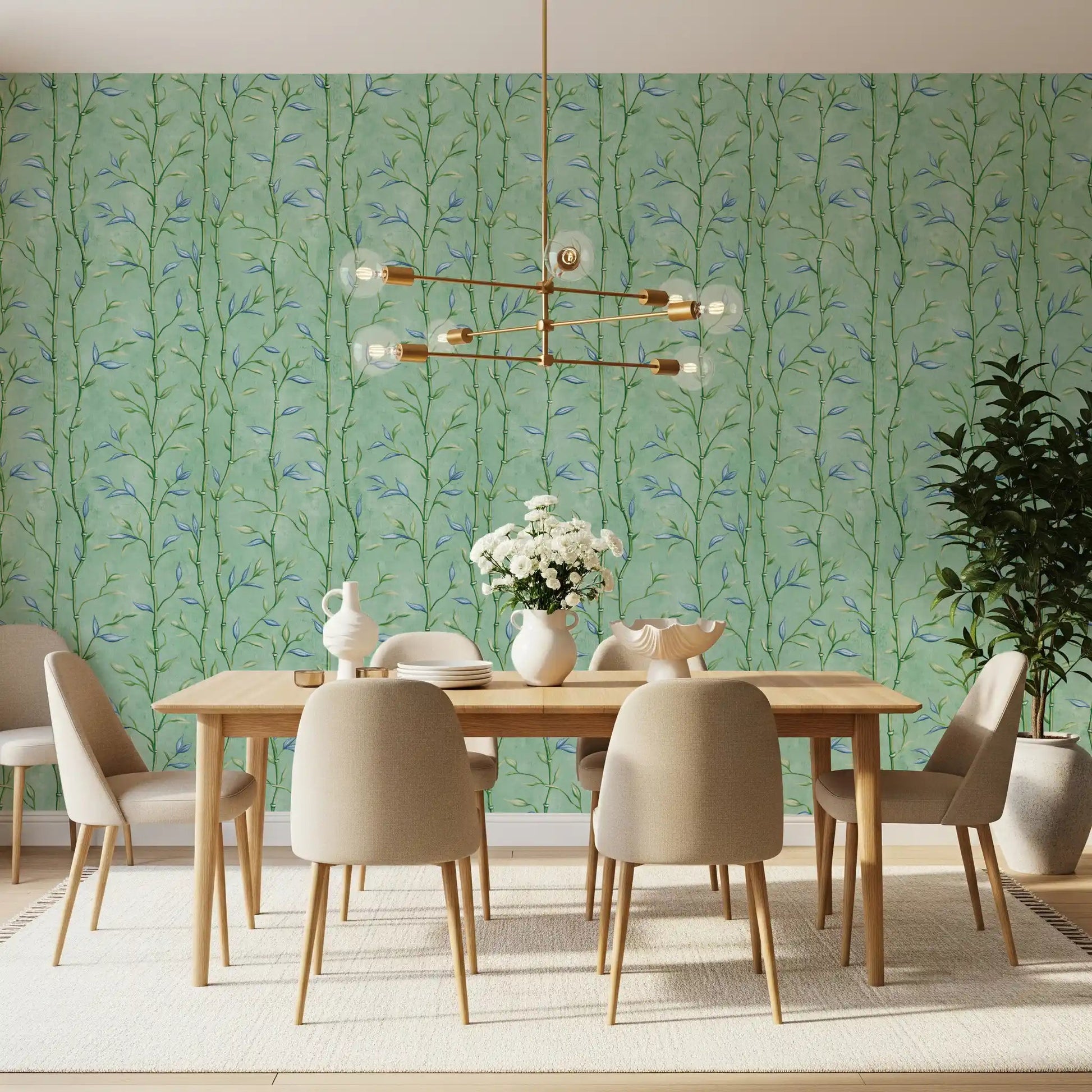 Bamboo leaf wallpaper in a dining area with pale blue and green accents