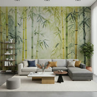 Bamboo Forest Serenity wallpaper mural in green behind a beige sofa, grey chaise and tall bookshelf
