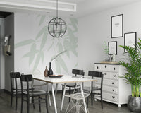 Delicate bamboo leaf silhouettes in sage tones adding a gentle organic touch to the wallpaper.