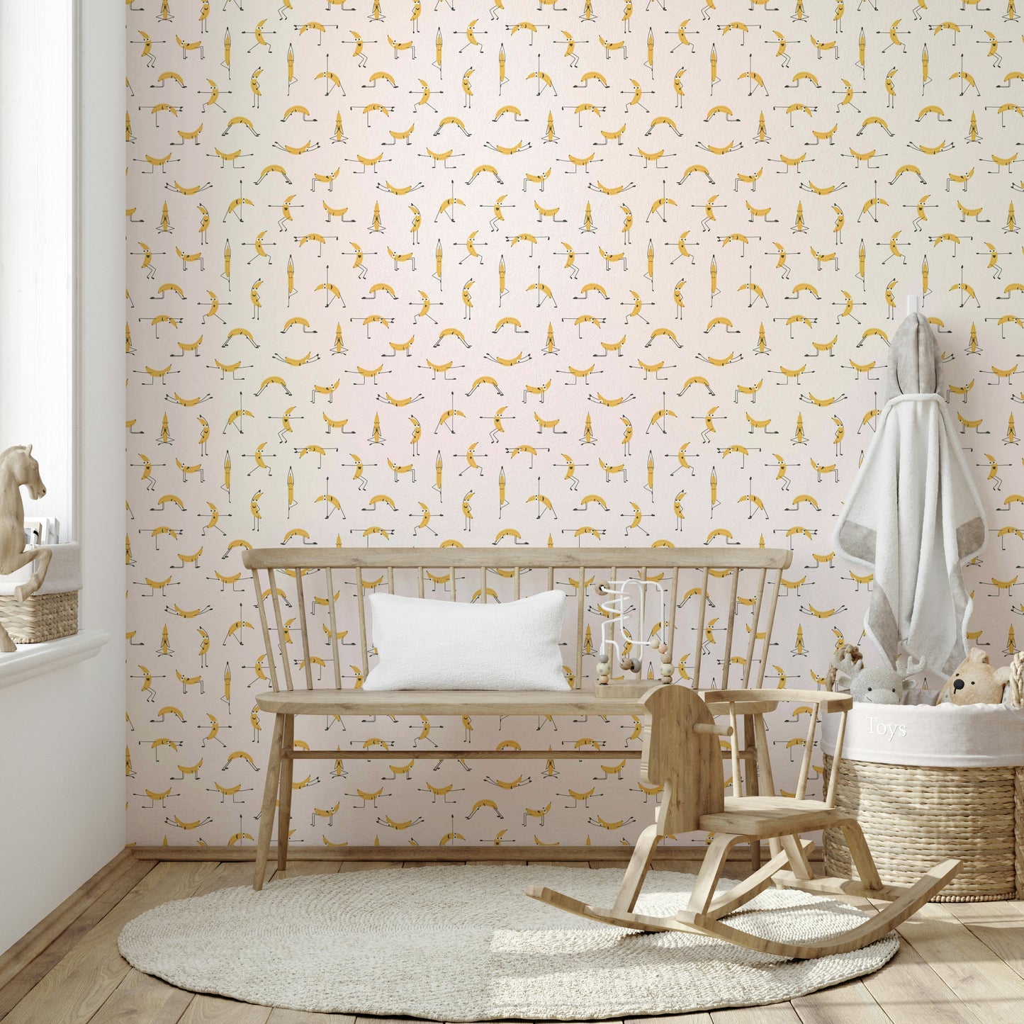 Playful kids' room with banana yoga wallpaper

