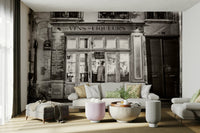 Paris sidewalk cafe mural with tables and cozy ambiance.

