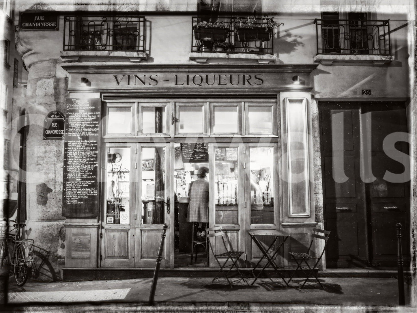 Timeless Paris bar scene mural bringing classic French style indoors.


