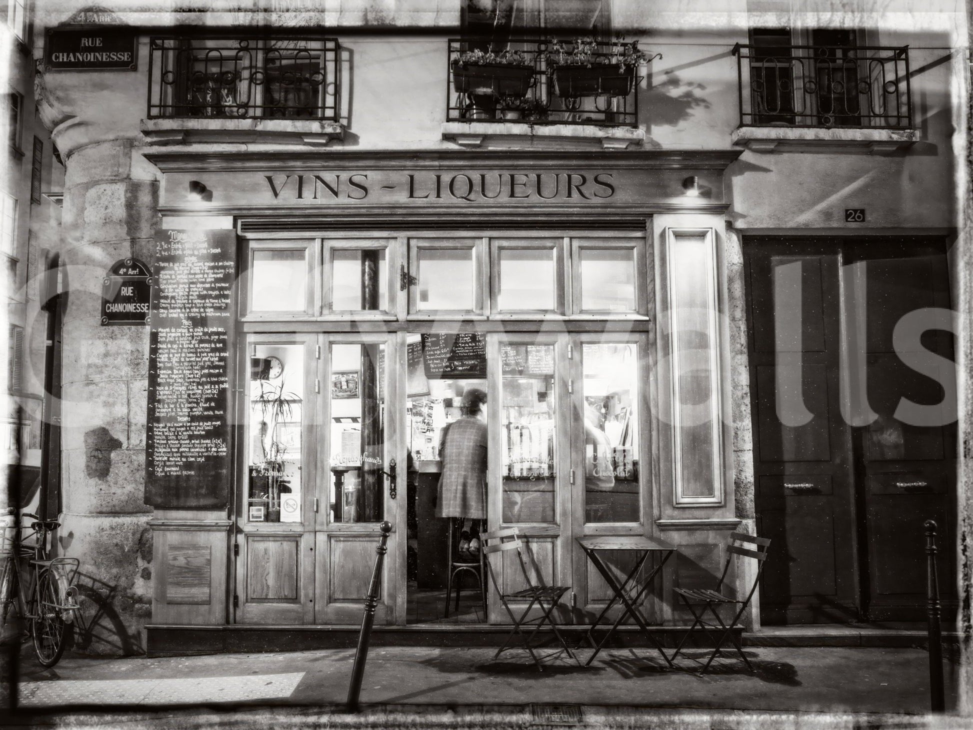 Timeless Paris bar scene mural bringing classic French style indoors.

