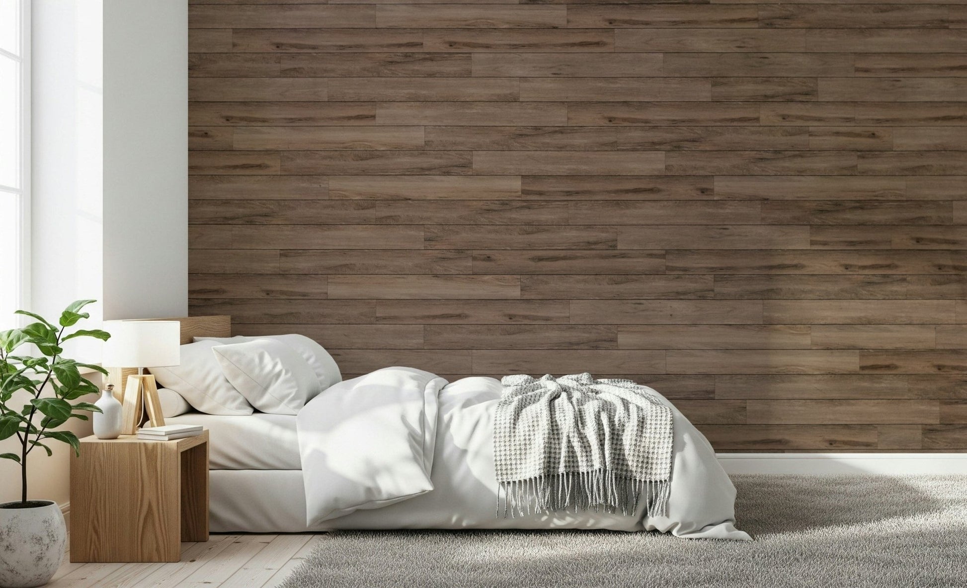 Barn Wood Beauty wallpaper mural in brown wood planks behind a white bed and wood nightstand in a bedroom