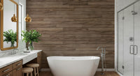 Barn Wood Beauty wallpaper mural in brown wood planks behind a white freestanding tub in a modern bathroom