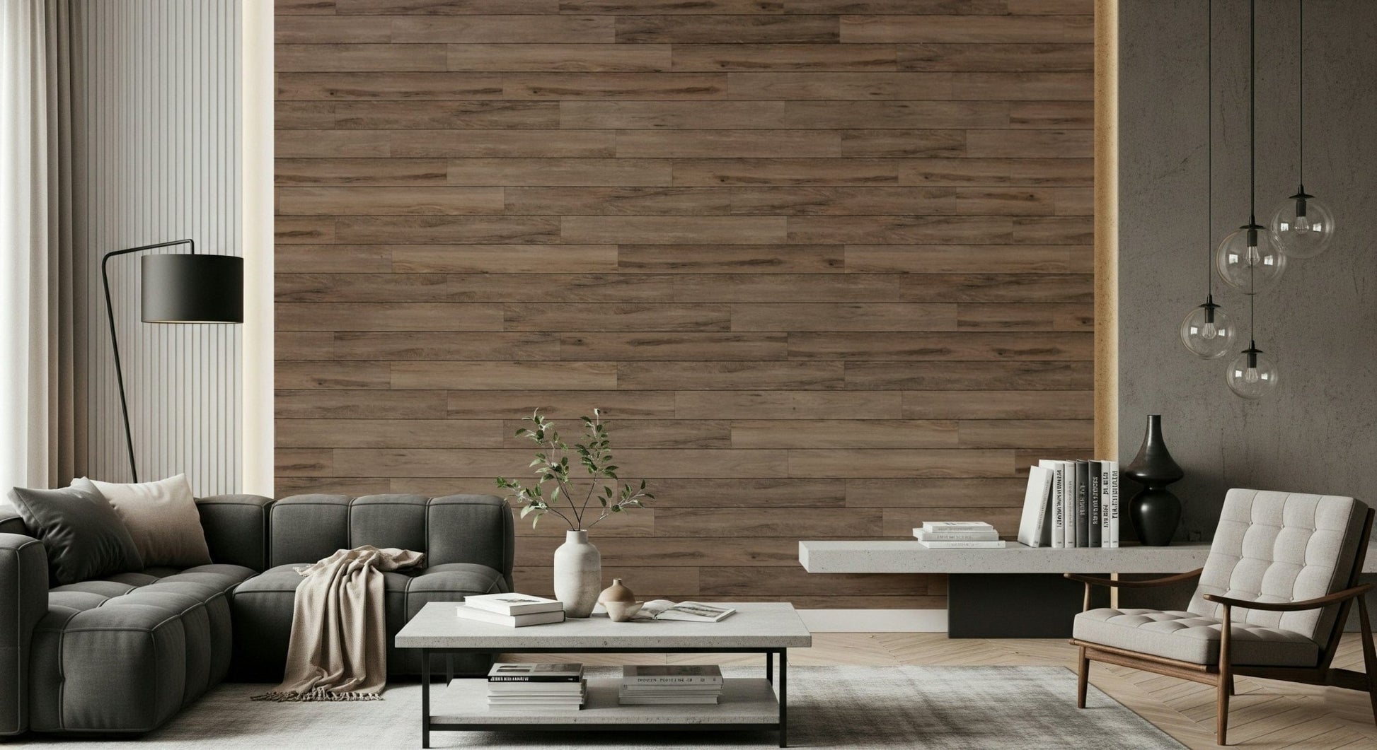Barn Wood Beauty wallpaper mural in brown wood planks behind a dark gray sectional and white armchair