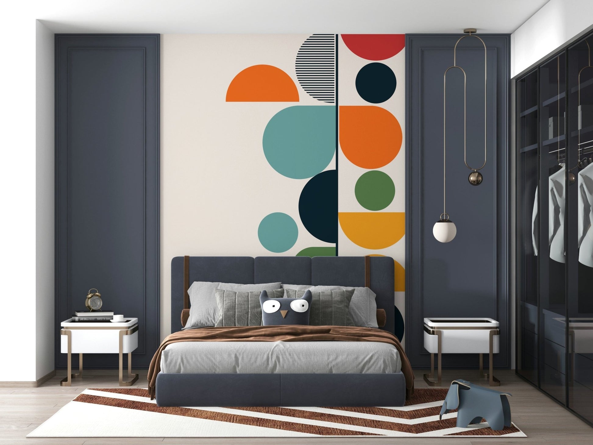Bauhaus Spring wallpaper mural behind a grey bed framed by navy panel walls in a bedroom