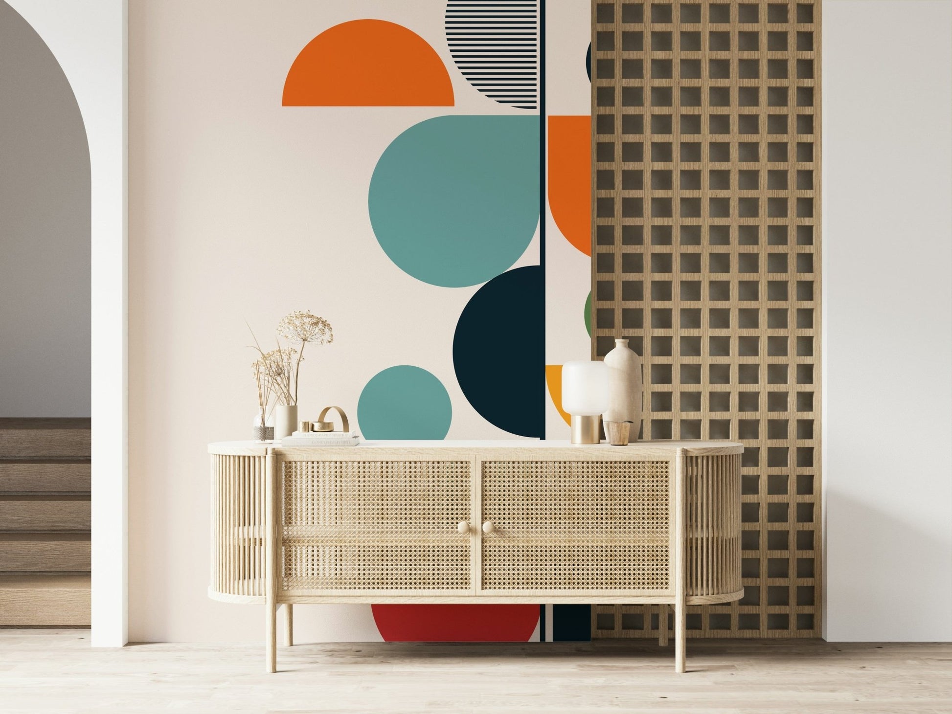 Bauhaus Spring wallpaper mural of bold circles above a cane sideboard near a lattice screen