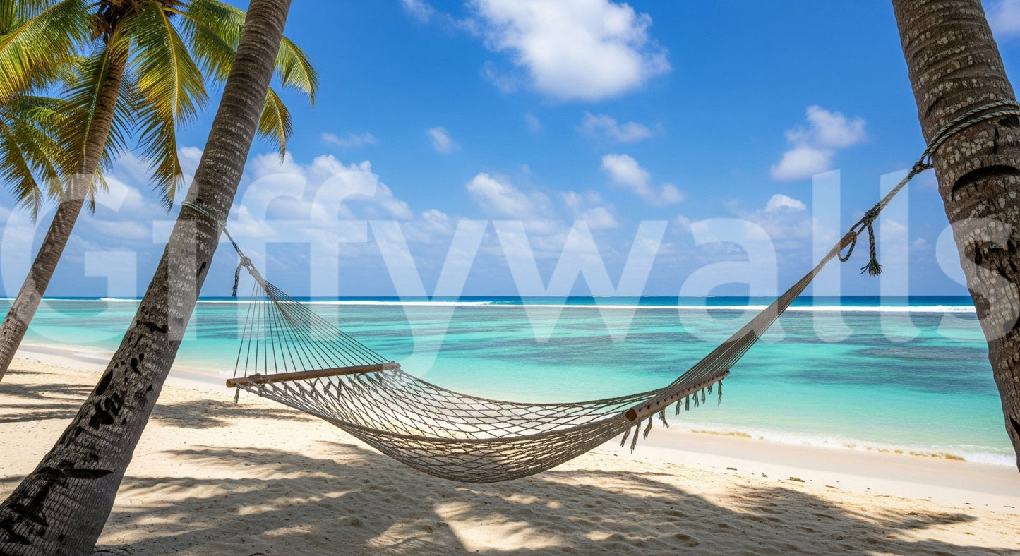 Beach Hammock Haven wallpaper mural shown as a full-wall scene of a net hammock strung between palms over a turquoise beach