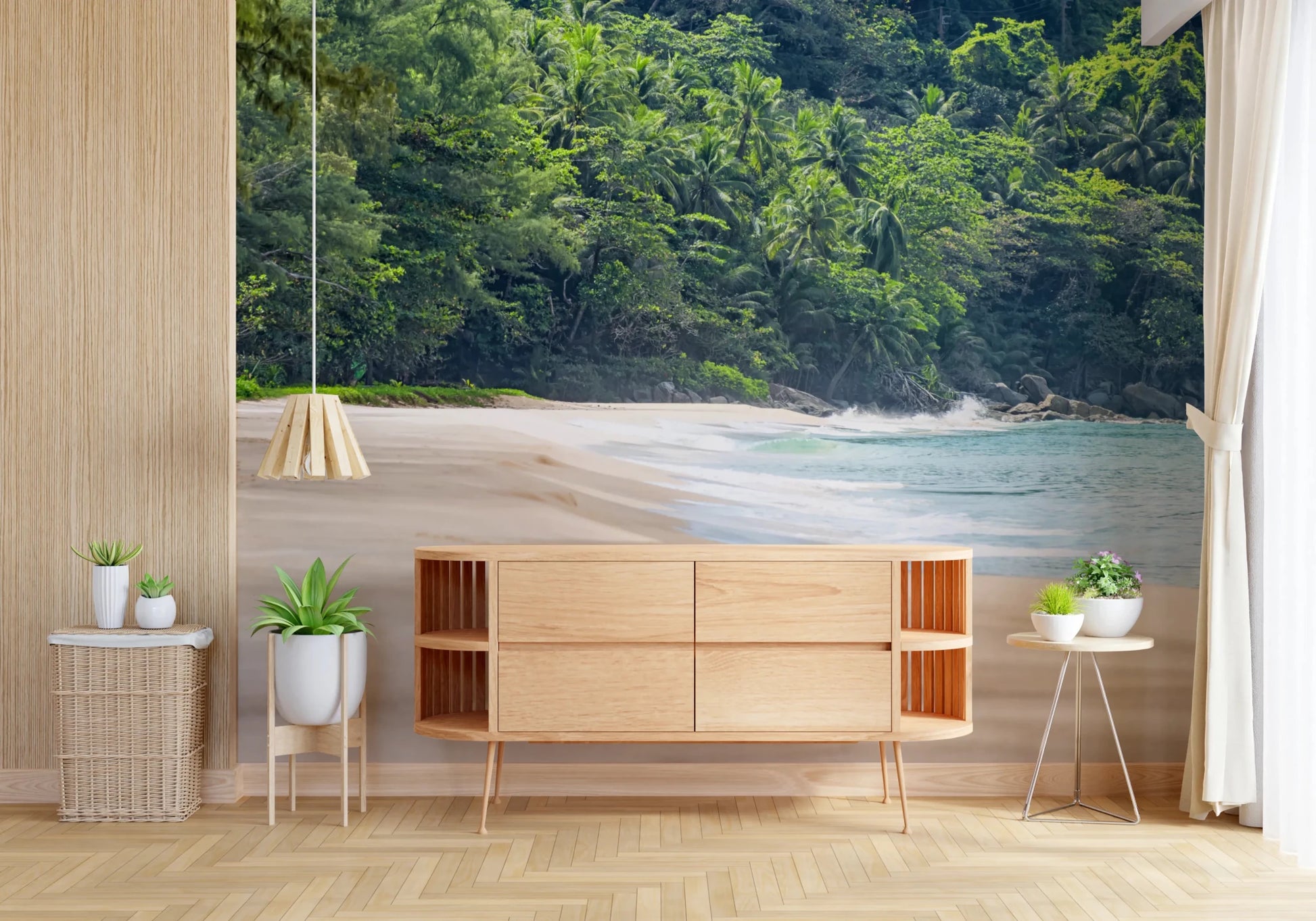 Beach Haven wall mural of sand and turquoise surf above a wood sideboard console and potted plants in a hallway