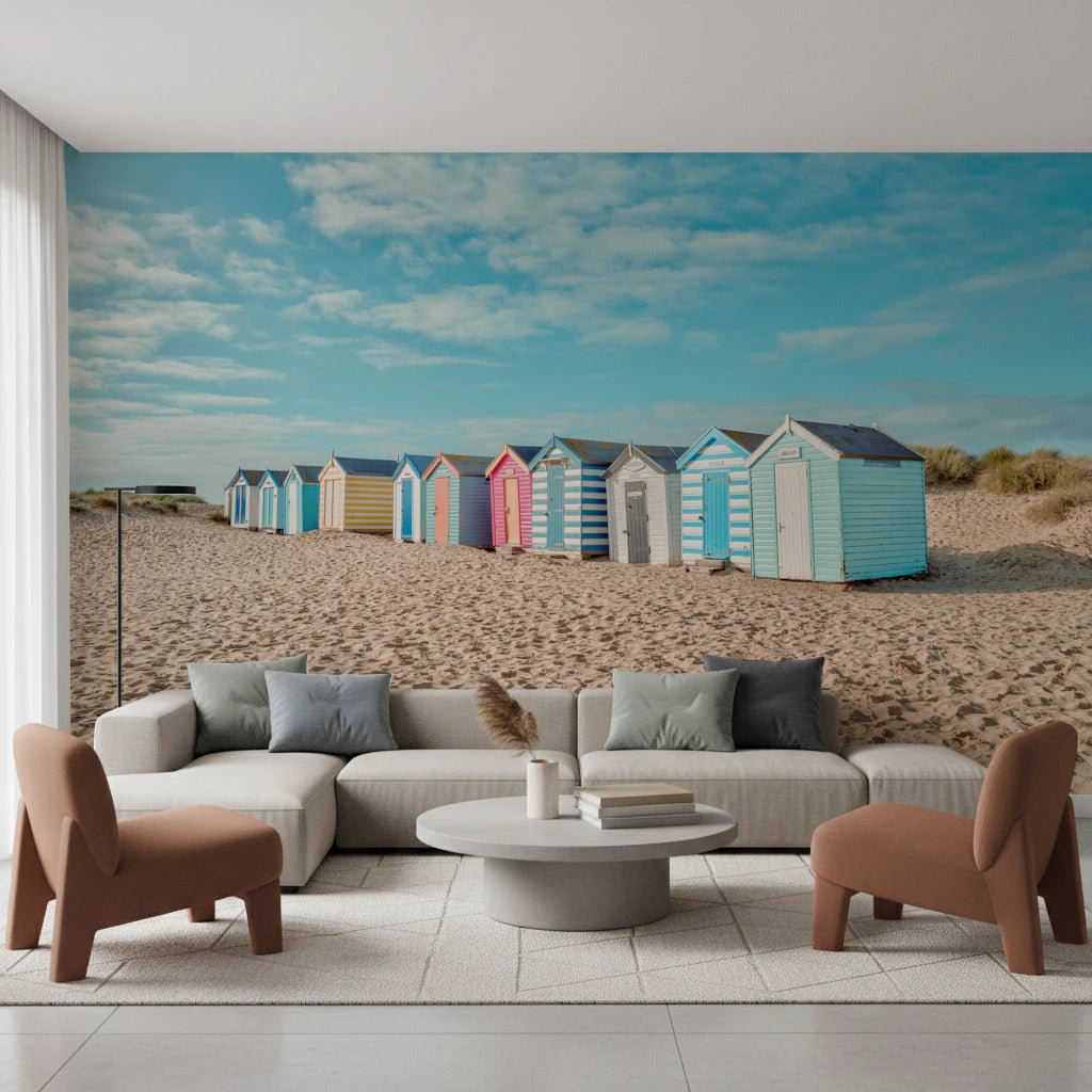 Colorful Beach Huts on the Shore living room Wall Mural with blue sky.