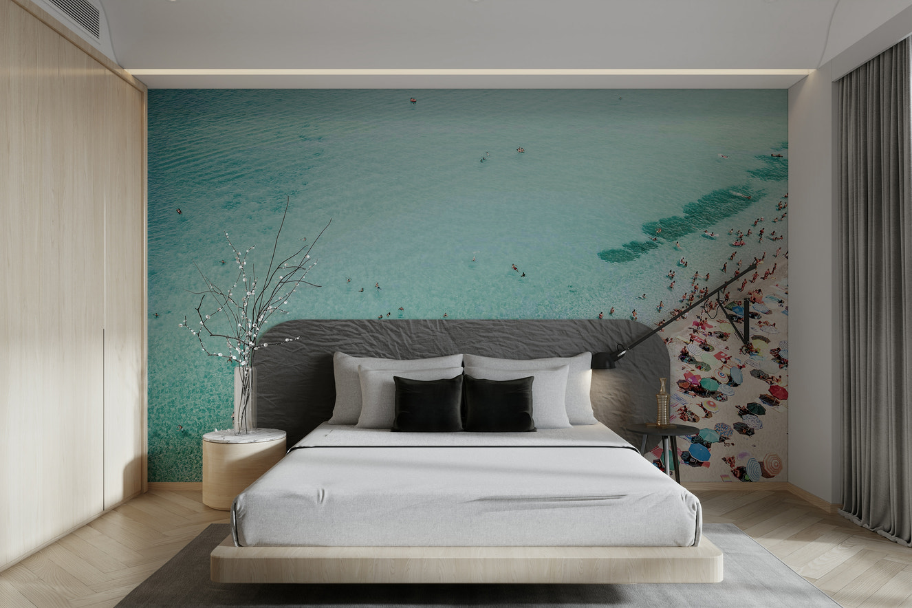 Beach People Wall Mural featuring vibrant beachgoers and surf.

