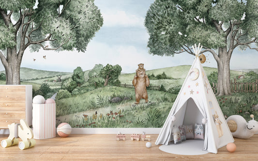 Bear and Bees wallpaper mural of a bear cub in a green meadow beside a white teepee tent in a kids room