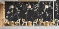 Beautiful Dark Black Flowers & Birds wallpaper mural as a feature wall in a home office workspace in black and white