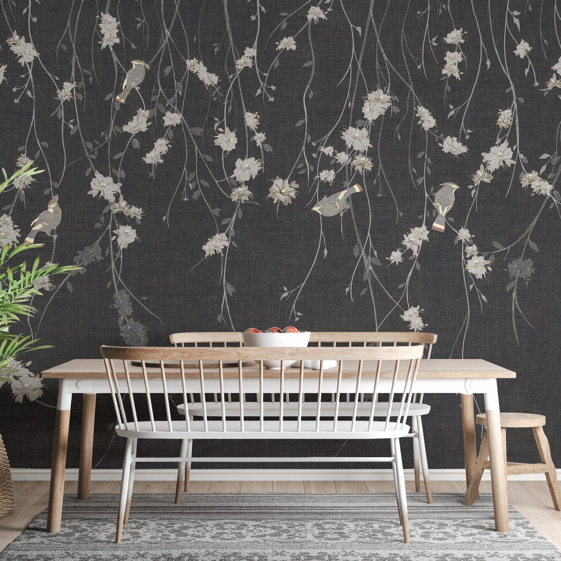 Beautiful Dark Black Flowers & Birds wallpaper mural styled as a feature wall behind a dining table and chairs