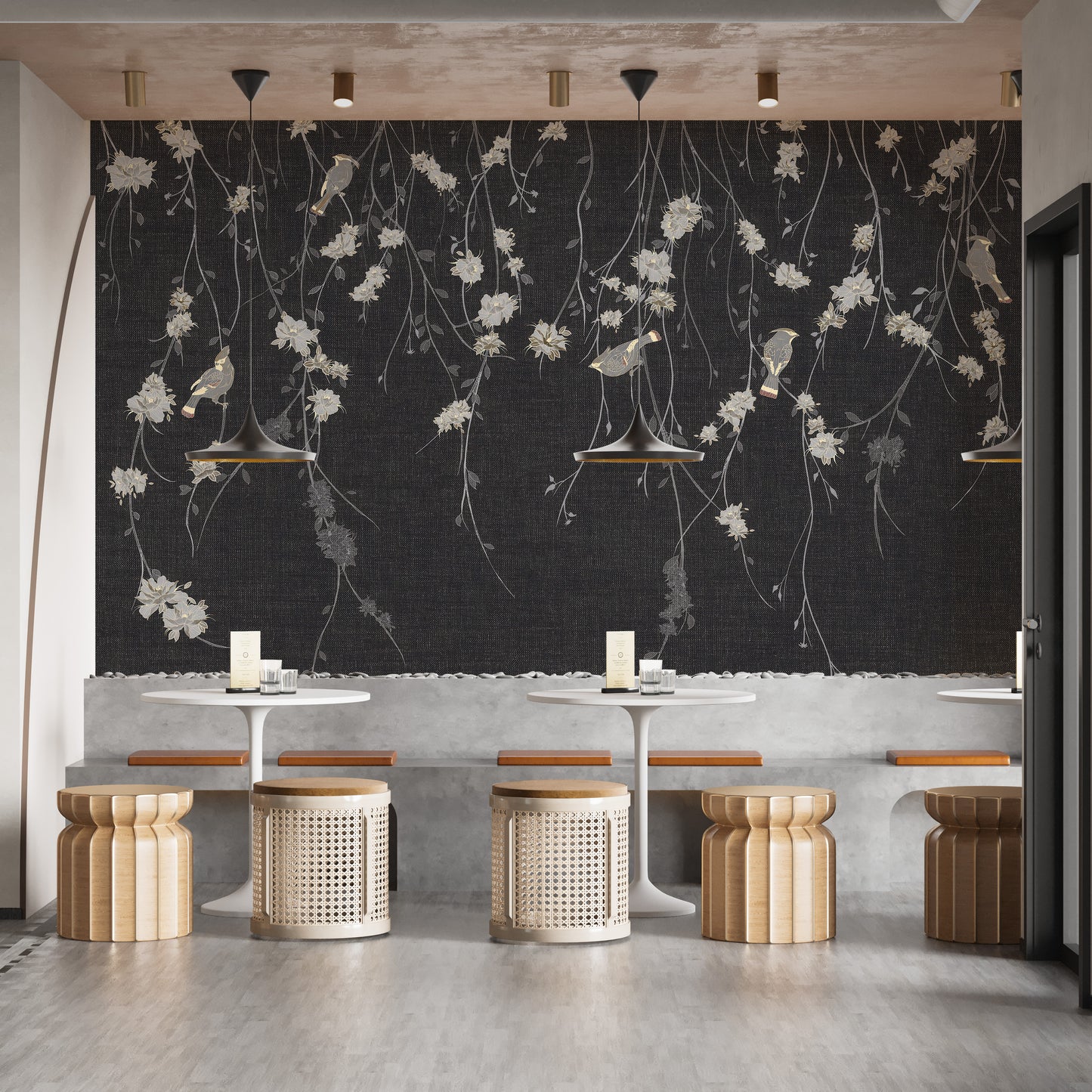Beautiful Dark Black Flowers & Birds wallpaper mural styled as a living room feature wall behind a sofa and seating