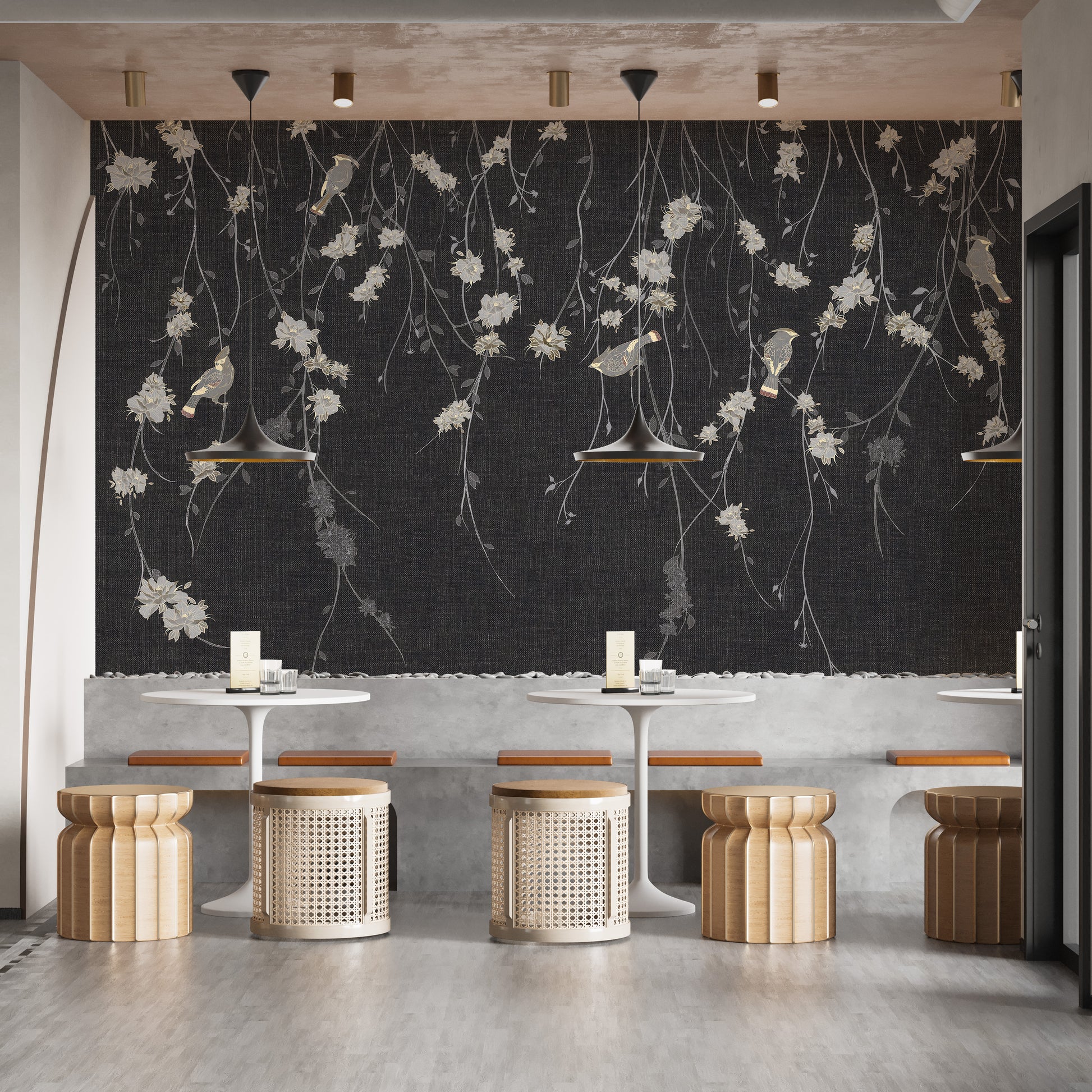 Beautiful Dark Black Flowers & Birds wallpaper mural styled as a living room feature wall behind a sofa and seating