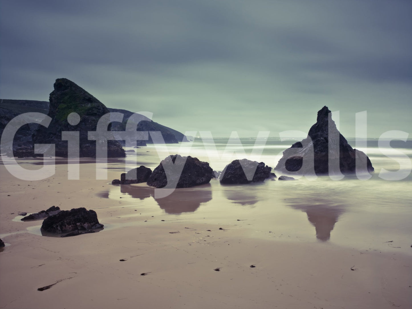 Close up of Bedruthan Steps rocks and sand texture