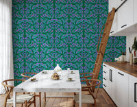 Berry Branch Symphony wallpaper behind a white marble dining table and wishbone chairs in a kitchen