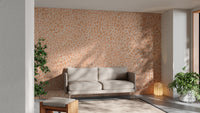 Pink geometric wallpaper mural featuring intricate mosaic design.
