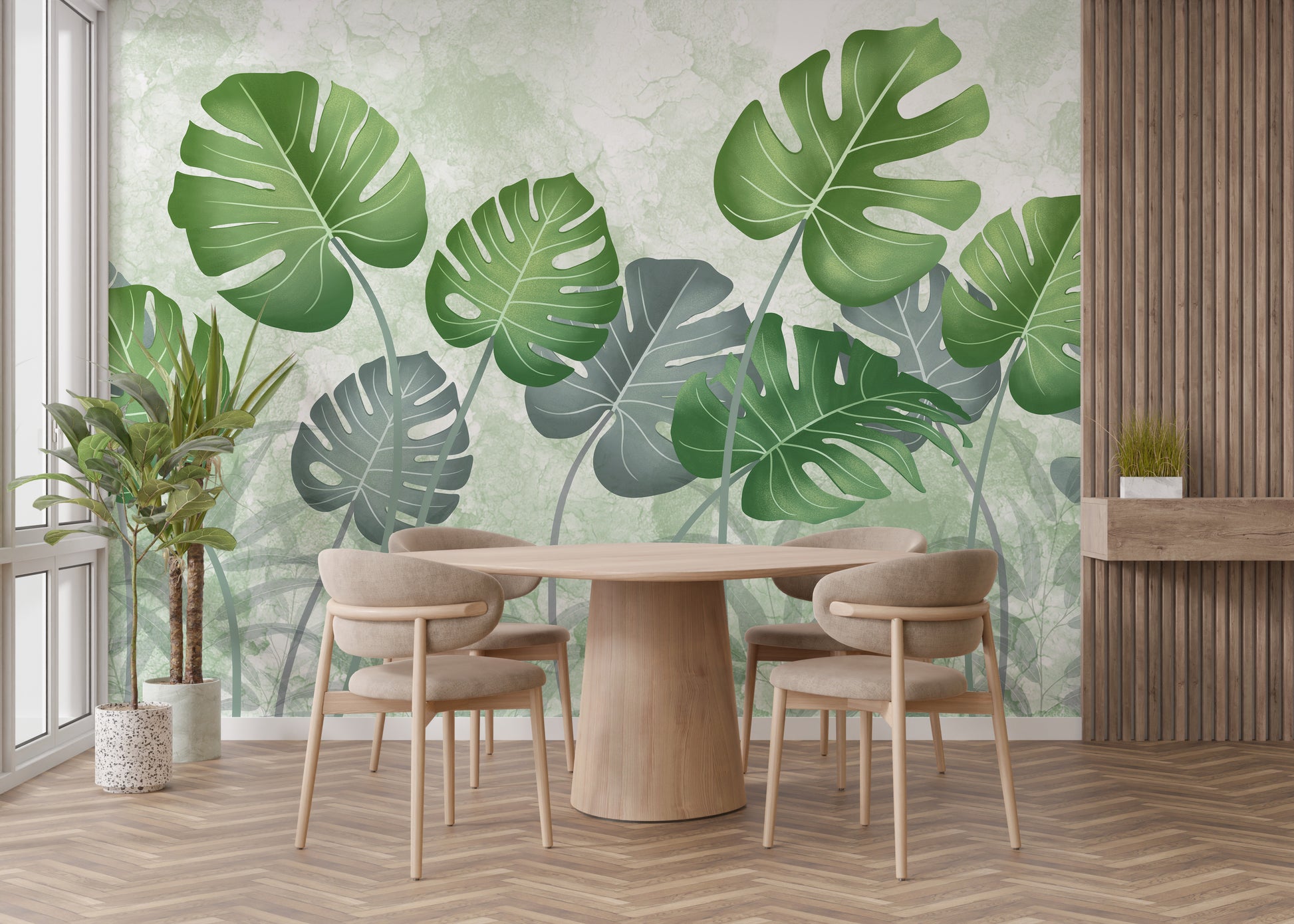 Best Tropical Wild Trees wallpaper mural with green monstera leaves behind a round wood dining table and chairs