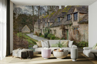 A high-resolution photo-realistic wall mural of Arlington Row in Bibury, England.

