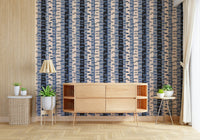 Living room media wall with graphic birch stripe pattern, blue black cream grey palette, modern look