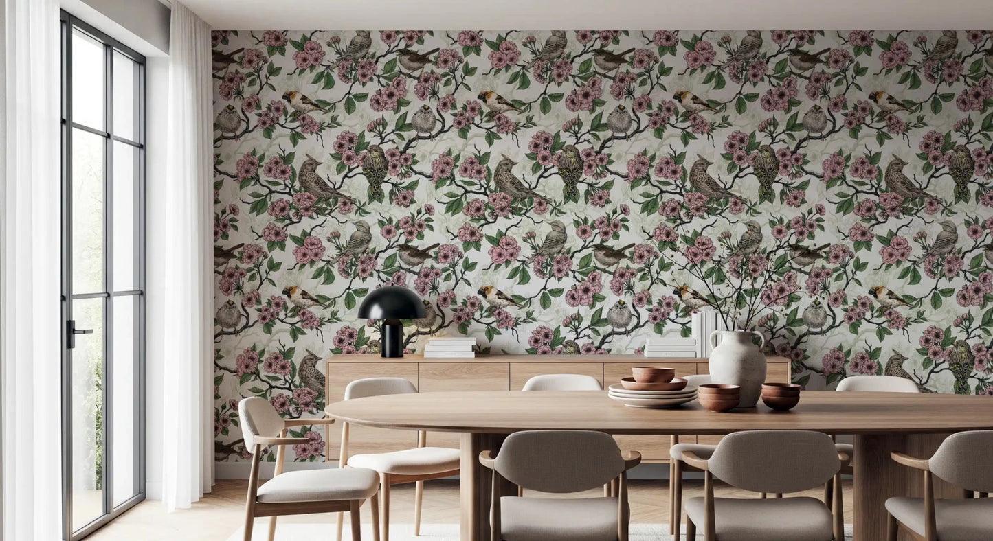 Kitchen and dining room with white wallpaper and pink blossom birds