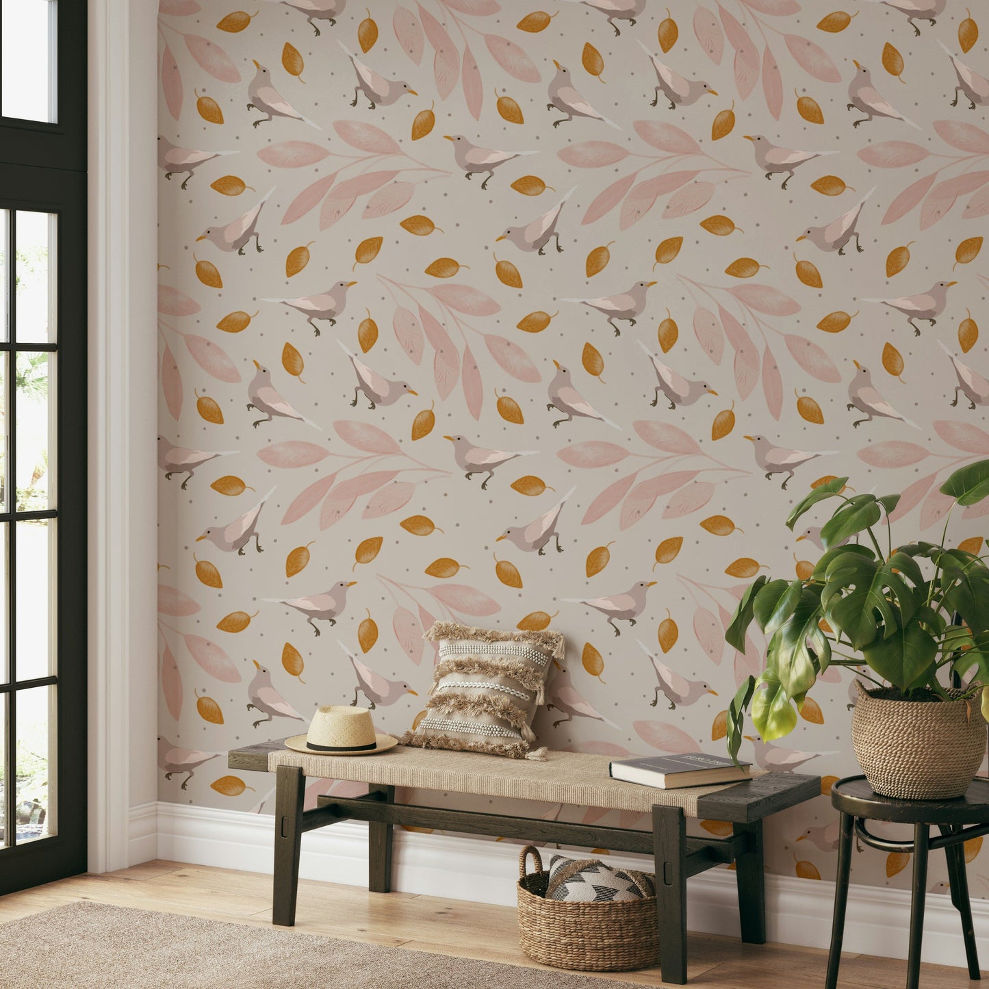 A serene wallpaper with gentle birds perched among pastel pink leaves and warm golden accents.