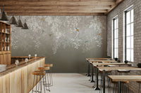 The composition is a wide, landscape view of the birds and blooms.

