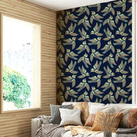 Elegant bird wallpaper with soothing mint and beige tones and deep blue accents.

