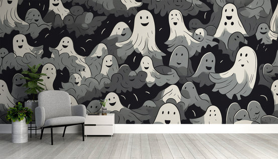 Black and White Ghosts Halloween wallpaper with smiling cartoon ghosts behind a gray armchair in a living room
