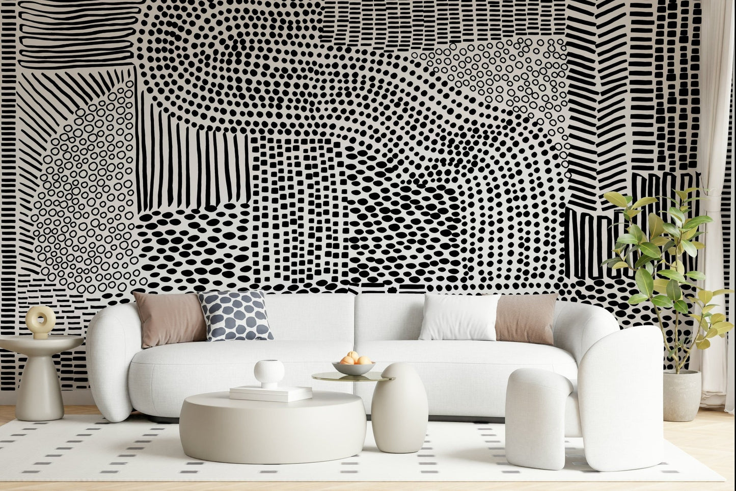 Black And White Maze wallpaper mural behind a white curved boucle sofa and round tables